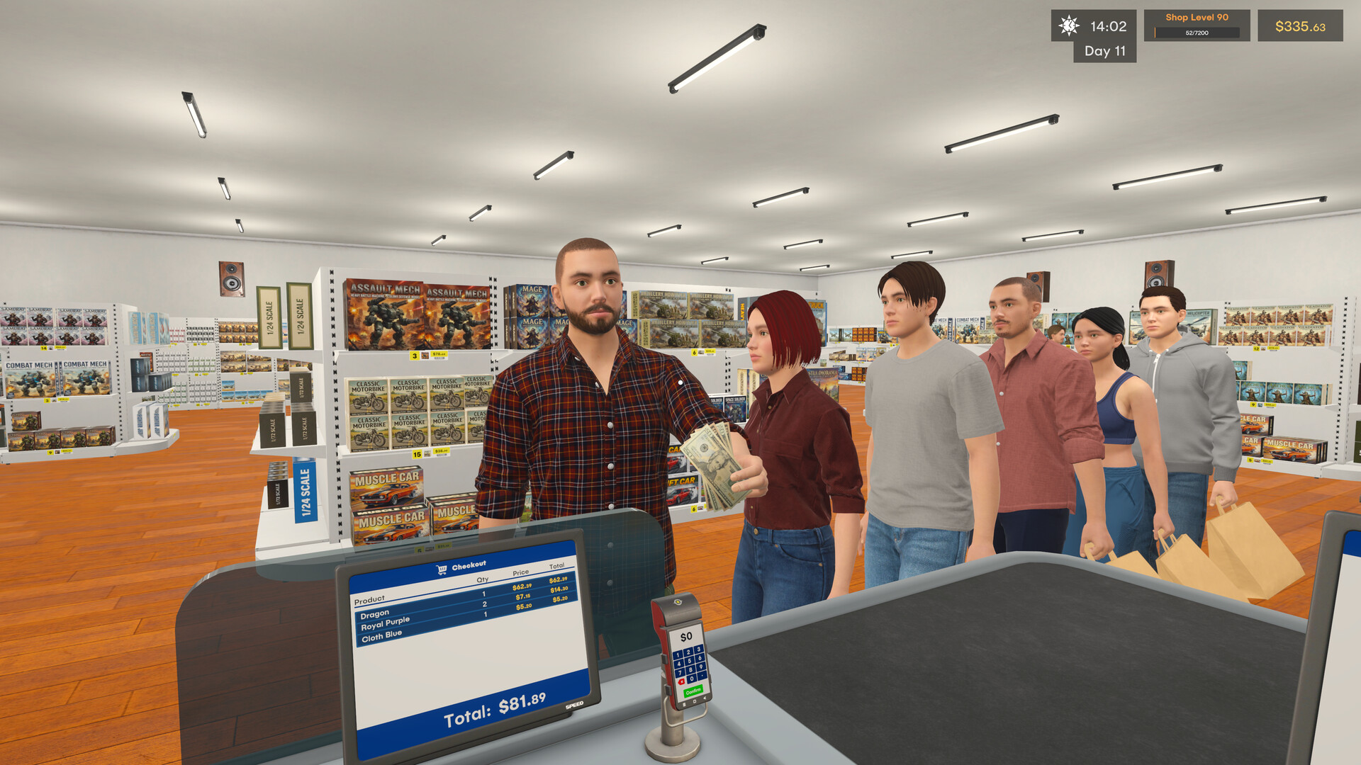 A queue of customers waiting at the checkout counter inside a shelved hobby shop, with a receipt showing a $81.89 total on the register screen